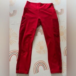 Red Fabletics Leggings with Mesh Side and Pockets
